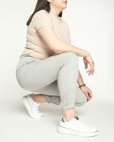 Royalfashion Damskie szare spodnie materiałowe typu joggery PLUS SIZE