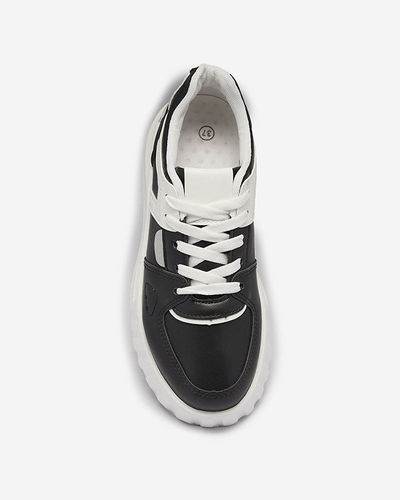 Royalfashion Eko-skórzane damskie czarne casualowe buty sportowe z białymi wstawkami Netiris