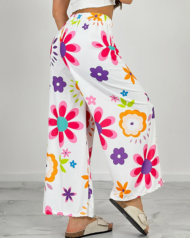 Royalfashion Ženske široke hlače s cvetličnim vzorcem