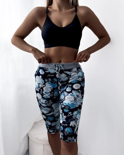 Royalfashion Temno modre ženske 3/4 hlače s cvetličnim vzorcem PLUS SIZE