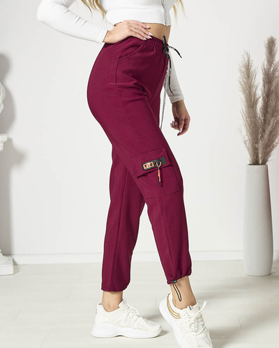 Royalfashion Bordowe damskie spodnie typu bojówki z łańcuszkiem