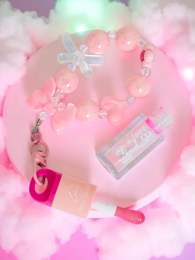 Otroški lip gloss z zapestnico Brezbarven