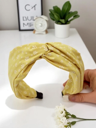 Royalfashion Okrašena pletena naglavna trakica Nela