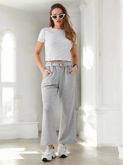 Royalfashion Široke ženske hlače iz tkanine z okrasnim pasom