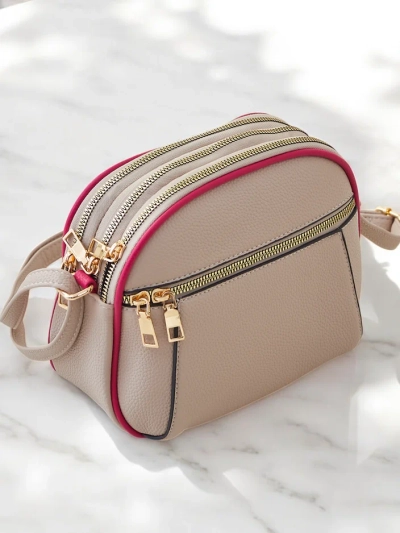 Royalfashion Majhna ovalna ženska torbica iz ekološke usnje