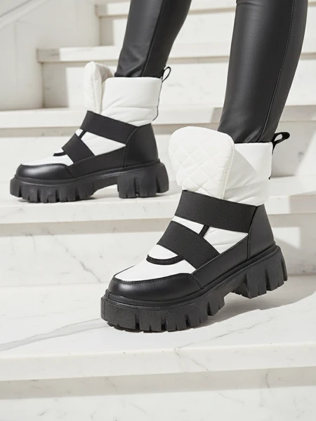 Royalfashion Buty a'la śniegowce damskie na płaskiej podeszwie w kolorze czarno- białym Ferory