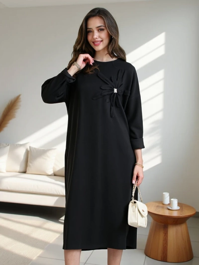 Royalfashion Ženska midi obleka iz materiala oversized s cvetom