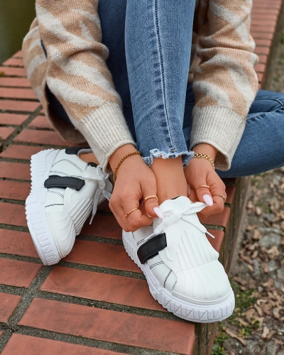 Royalfashion Czarno-białe damskie buty sportowe z gumowymi wstawkami Inika