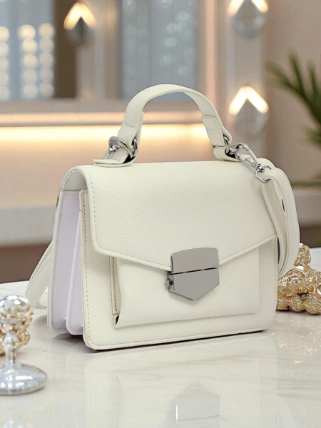 Royalfashion Ženska torbica–pisemska ovojnica z ročajem Amalthea Avorio