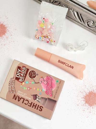 Lip gloss z zapestnico Gloss & Charm Cocoa Cookie