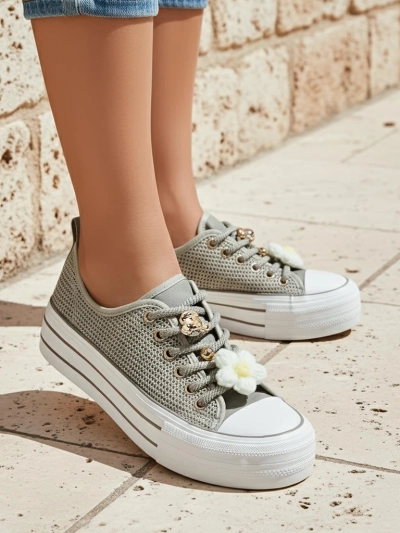 Royalfashion Ženske perforirane tenisice z okrasnimi elementi Osdo