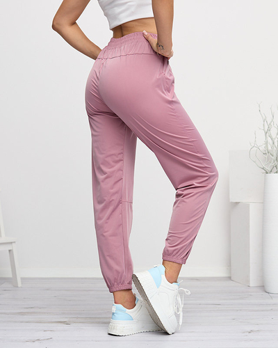 Royalfashion Ciemnoróżowe damskie spodnie dresowe typu joggery