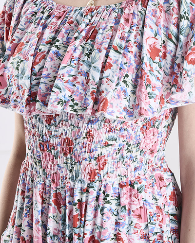 Royalfashion Biało- różowy długi kombinezon damski w kwiaty