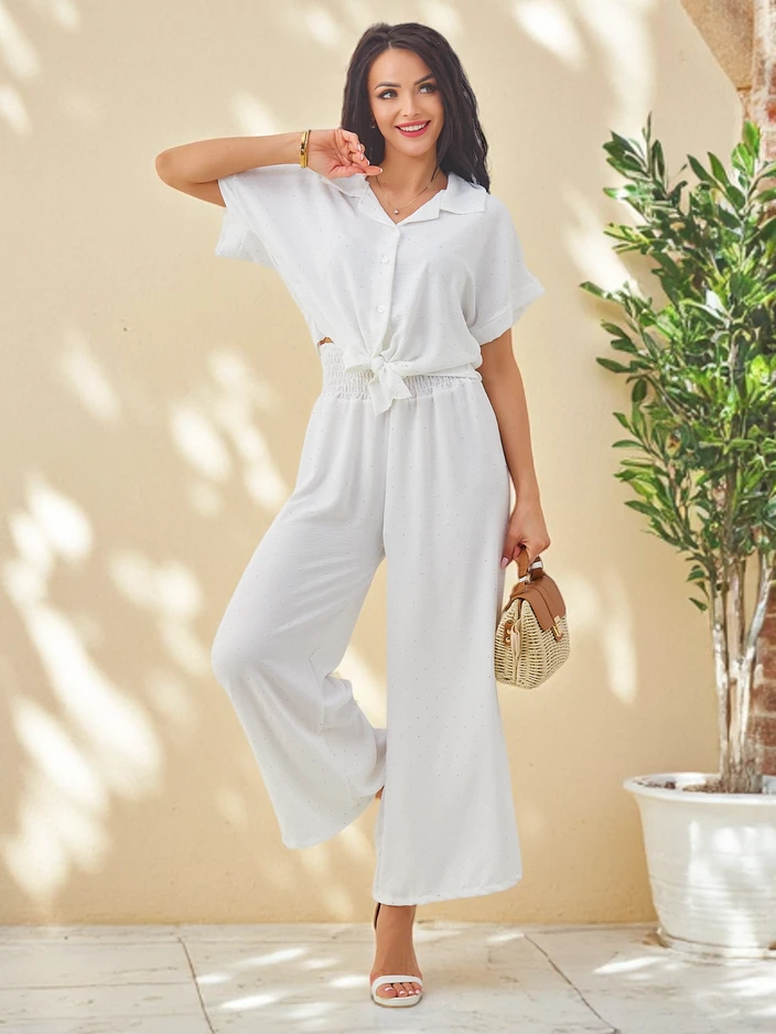 Royalfashion Ženski set z zavezanimi kratkimi rokavi in razširjenimi hlačami z diamanti