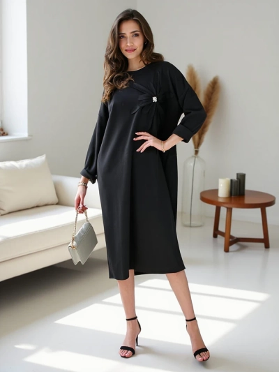 Royalfashion Ženska midi obleka iz materiala oversized s cvetom