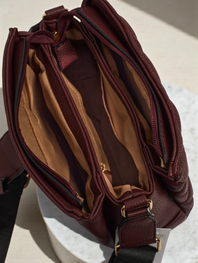 Majhna prešita torbica iz mehkega eko usnja Cinder Loom