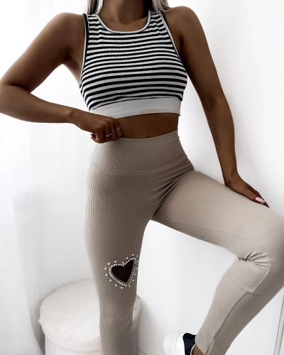 Royalfashion Damskie legginsy w kolorze beżowym z serduszkiem