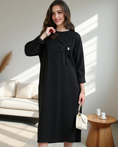 Royalfashion Ženska midi obleka iz materiala oversized s cvetom