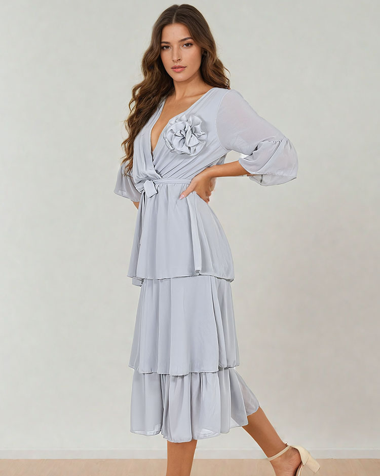 Royalfashion Ženska midi obleka z volančki