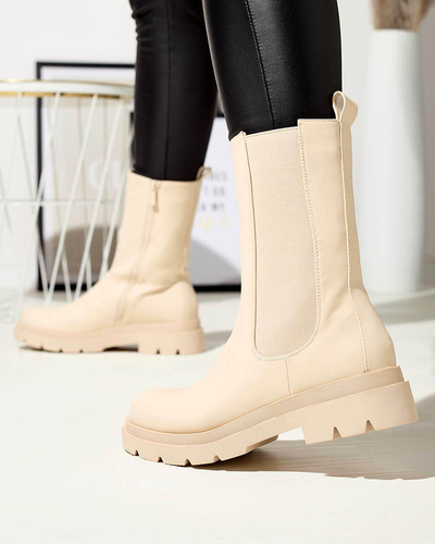 Royalfashion Beżowe damskie wysokie botki na płaskim obcasie Vedesa