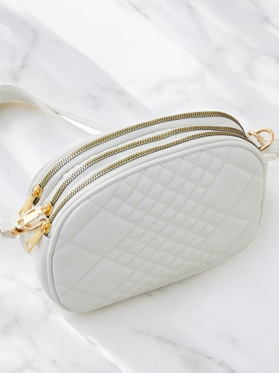 Royalfashion Mala ovalna ženska torbica iz ekološke kože