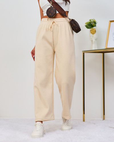 Royalfashion Ženske hlače iz velurja v kremasti barvi