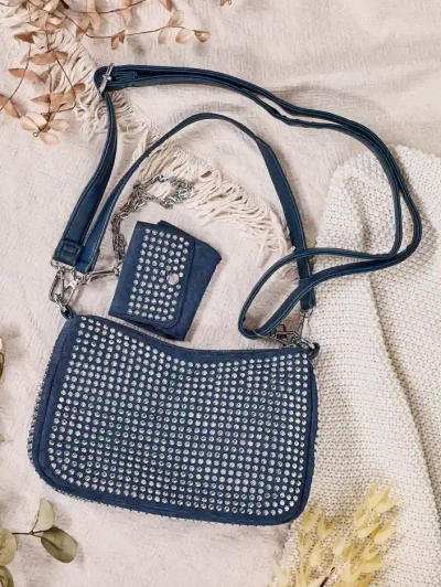 Royalfashion Mala ženska torbica s žebljički
