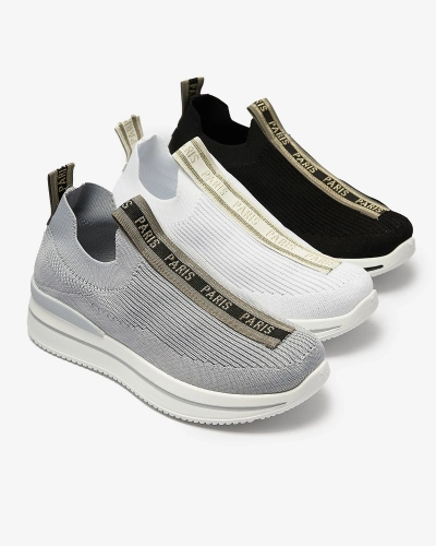 Royalfashion Wsuwane buty sportowe damskie z napisami w kolorze białym Cerppa