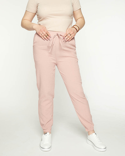 Royalfashion Damskie różowe spodnie materiałowe typu joggery PLUS SIZE