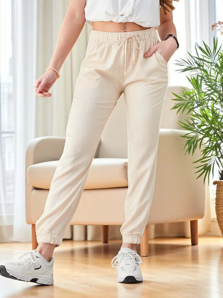 Eleganten ženski jogger Aura Bež Lyocell - Udobje in stil za vsak dan
