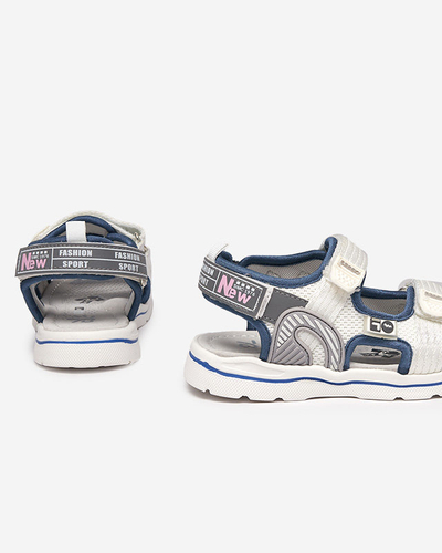 Royalfashion Białe dziecięce sandałki z naszywkami Kiteks