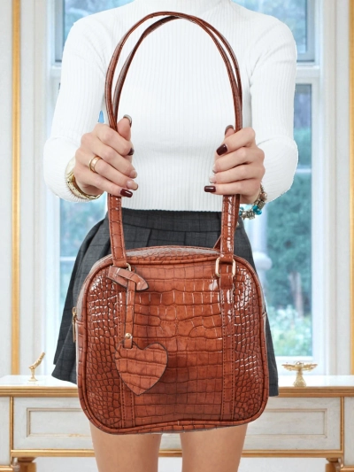 Lakirana majhna ženska torbica iz eko usnja Velinne