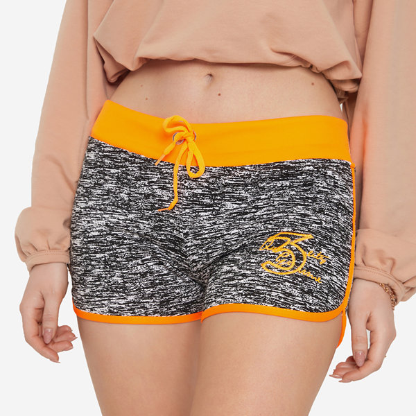 Royalfashion Pomarańczowo-czarne damskie sportowe krótkie spodenki