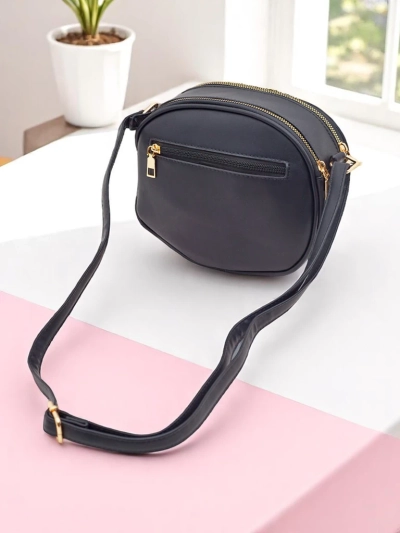 Royalfashion Majhna okrogla ženska torbica iz eko usnja Riva Circle