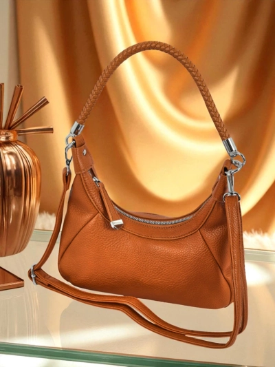 Royalfashion Malá dámska kabelka z ekologickej kože s ozdobným opaskom Lacquea