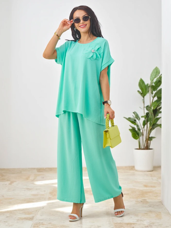 Royalfashion Ženski komplet s kratkimi rokavi, okrašen z cvetličnim motivom in širokimi hlačami