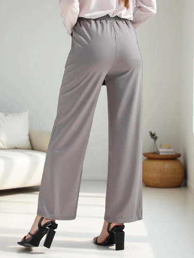 Royalfashion Široke ženske hlače z dekorativno spono