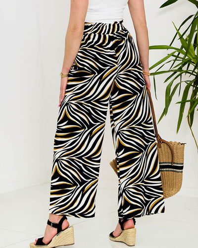 Royalfashion Wzorzyste spodnie damskie typu palazzo w kolorze czarnym