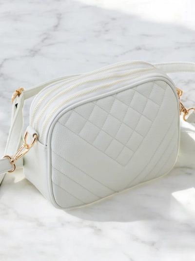 Royalfashion Mala ženska torbica iz ekološke kože z embosiranjem