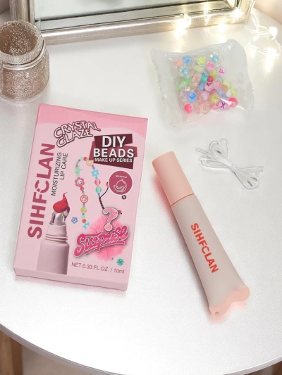 Sijaj za ustnice z zapestnico Gloss & Charm Melon Pop