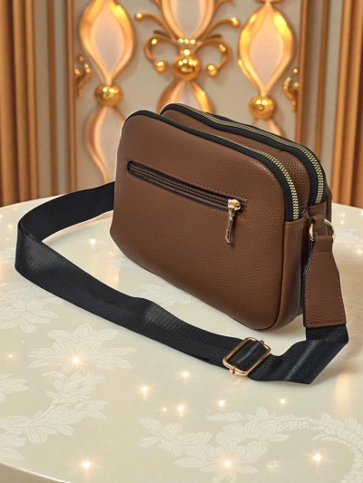 Majhna prešita torbica iz mehkega eko usnja Copper Veil