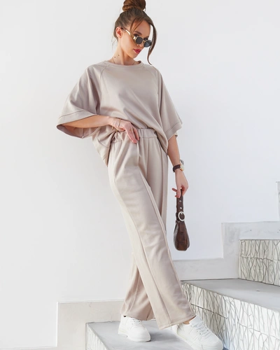 Royalfashion Ženska obleka s kratkimi rokavi in širokimi hlačami