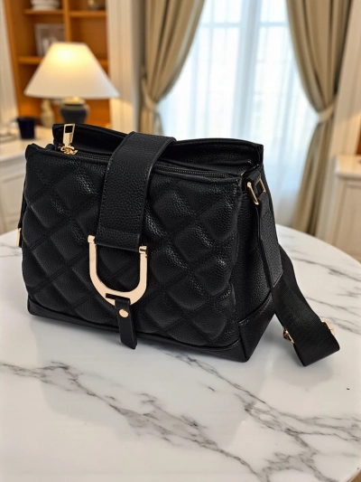 Majhna prešita torbica iz mehkega eko usnja Cinder Loom