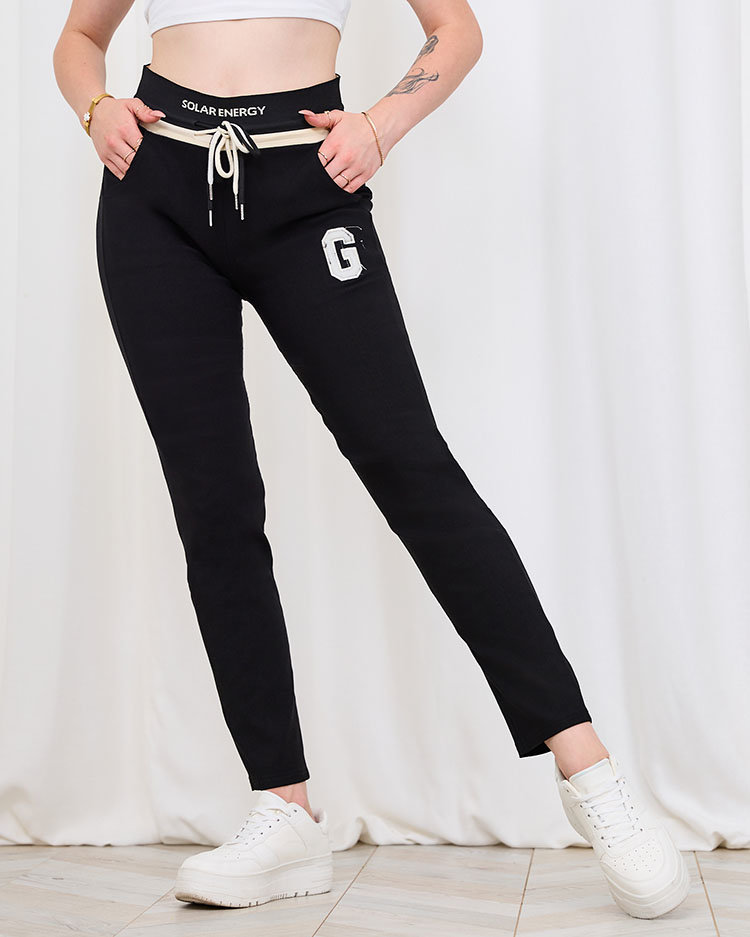 Royalfahion Ženske črne športne hlače z našitkom PLUS SIZE