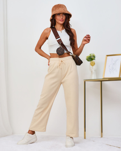 Royalfashion Ženske hlače iz velurja v kremasti barvi