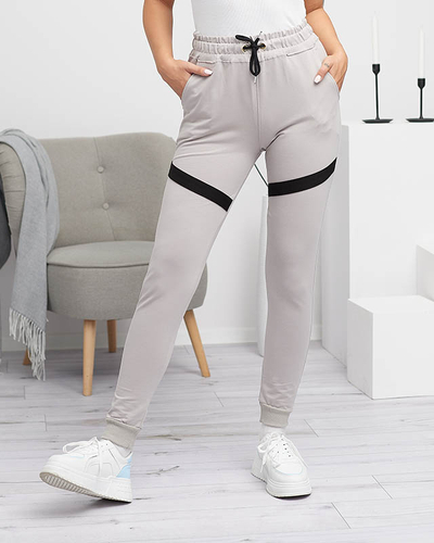 Royalfashion Damskie spodnie dresowe w kolorze jasnoszarym