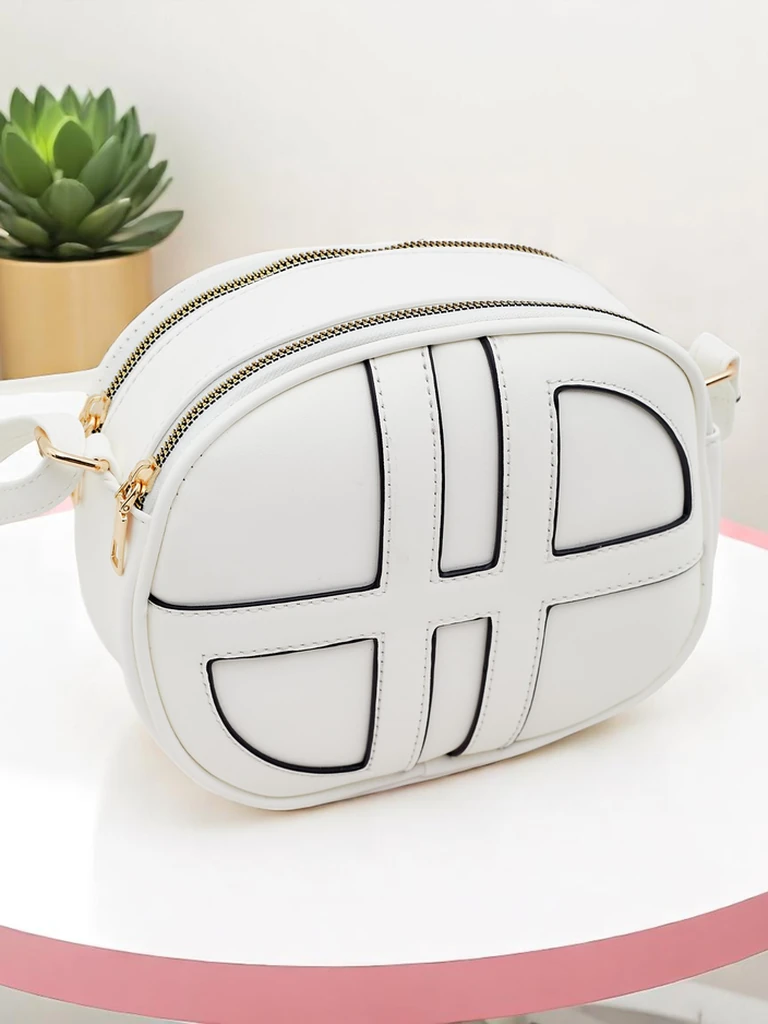 Royalfashion Majhna ženska okrogla torbica iz eko usnja Riva Circle