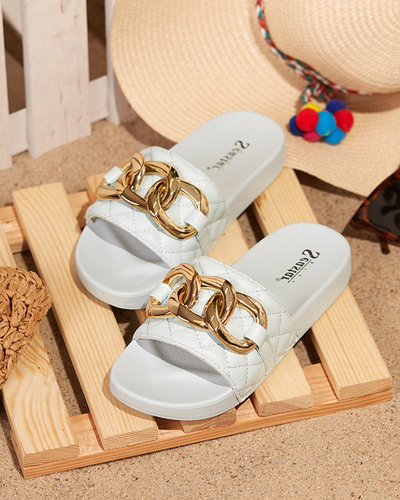 OUTLET Niebieskie damskie pikowane klapki ze złotym łańcuszkiem Eteris - Obuwie