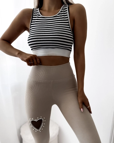 Royalfashion Damskie legginsy w kolorze beżowym z serduszkiem