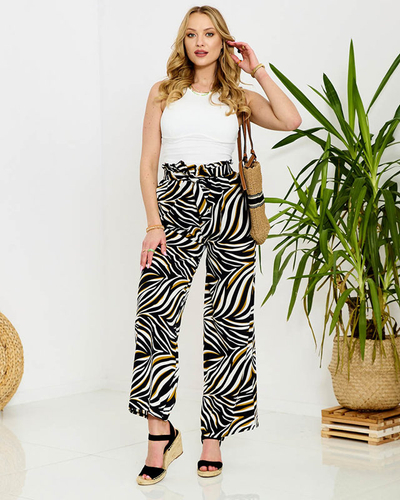 Royalfashion Wzorzyste spodnie damskie typu palazzo w kolorze czarnym